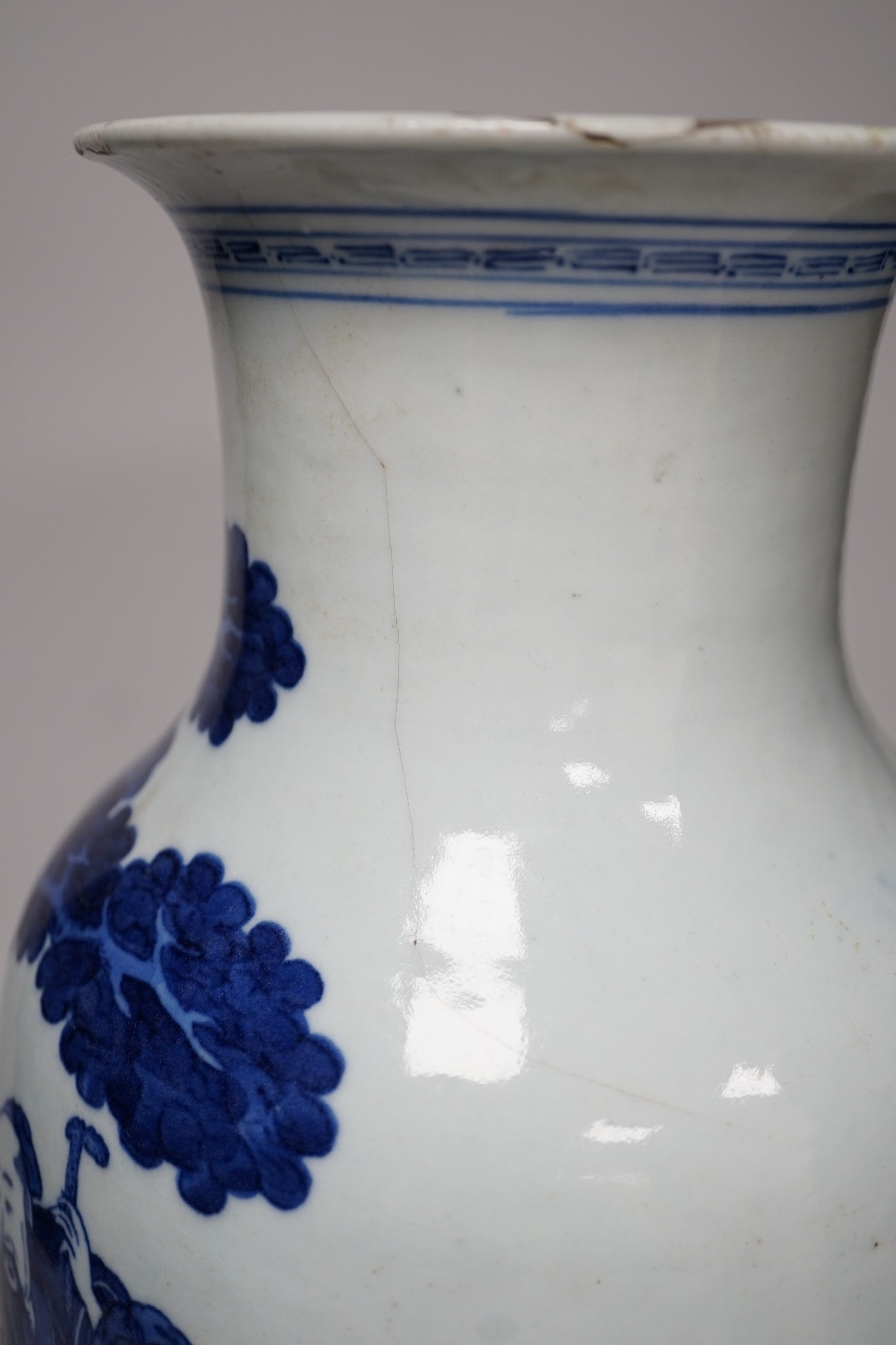A large Chinese blue and white export vase, decorated with sages and attendants reviewing a scroll (a.f.), 37cms high